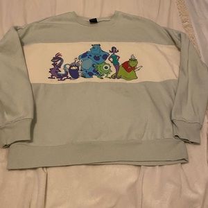 Monsters Inc color block sweater
